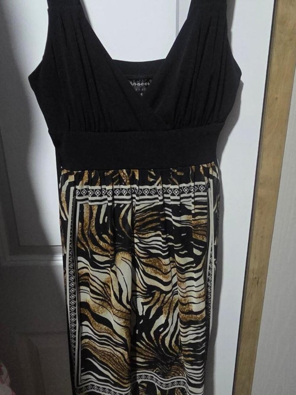 Connected black and brown dress with zebra print. Size: 6 #zebraprint #dress